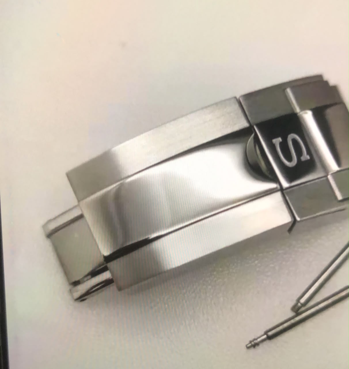 Clasp and crown